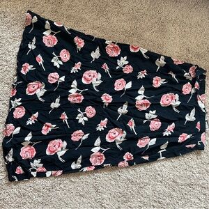 Black skirts with pink floral designs